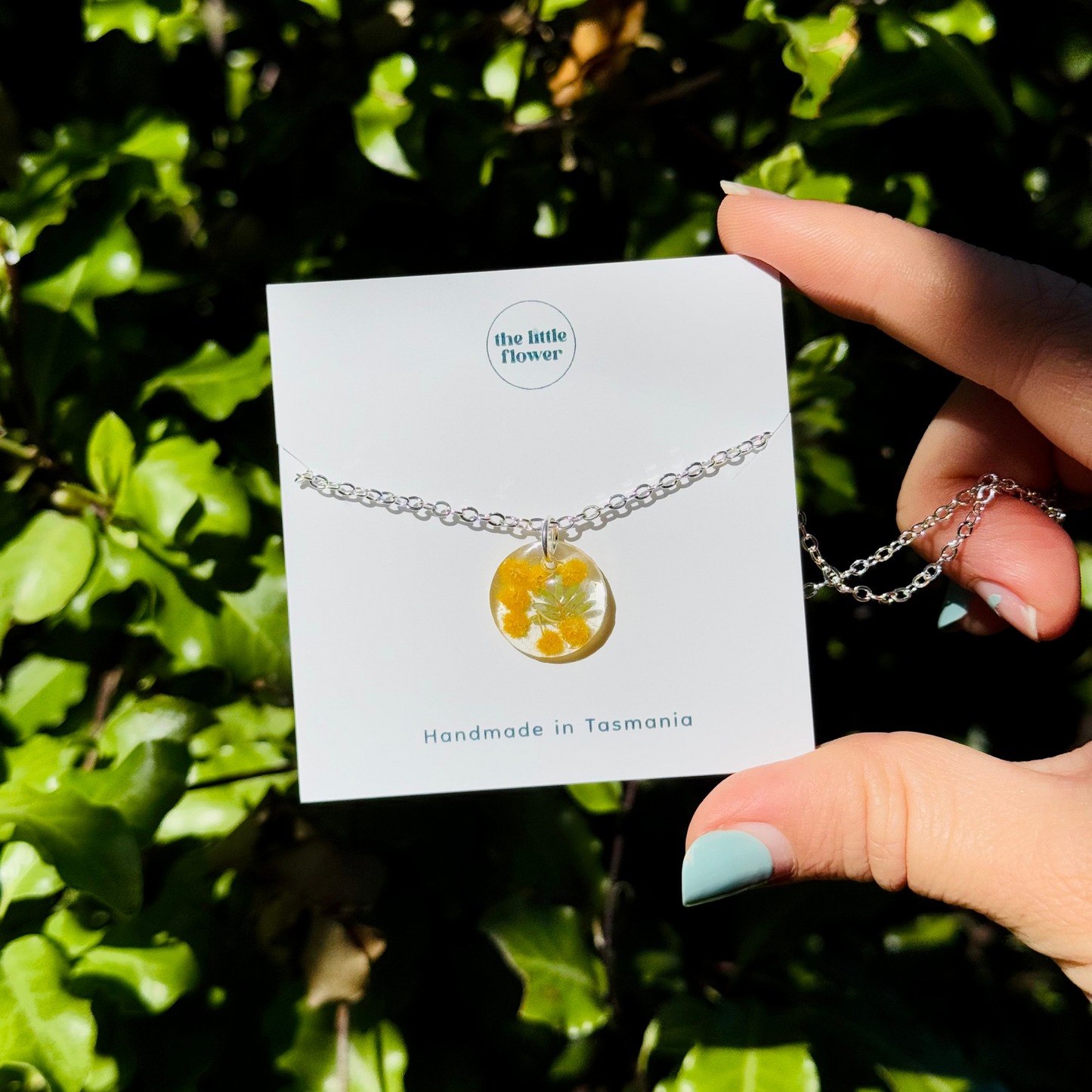 Native Wattle Necklace with real Australian wattle flowers preserved in clear resin on a silver-plated chain