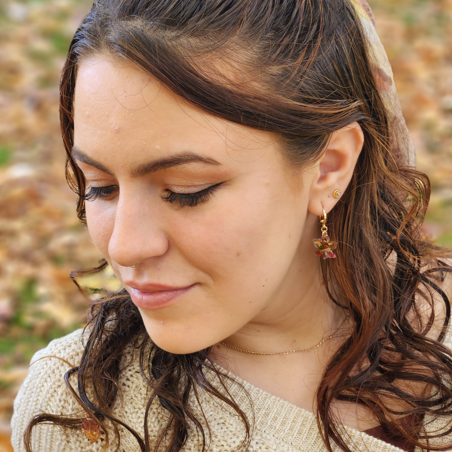 Autumn Leaf Huggie Earrings in Gold, Earring model image, styled jewellery