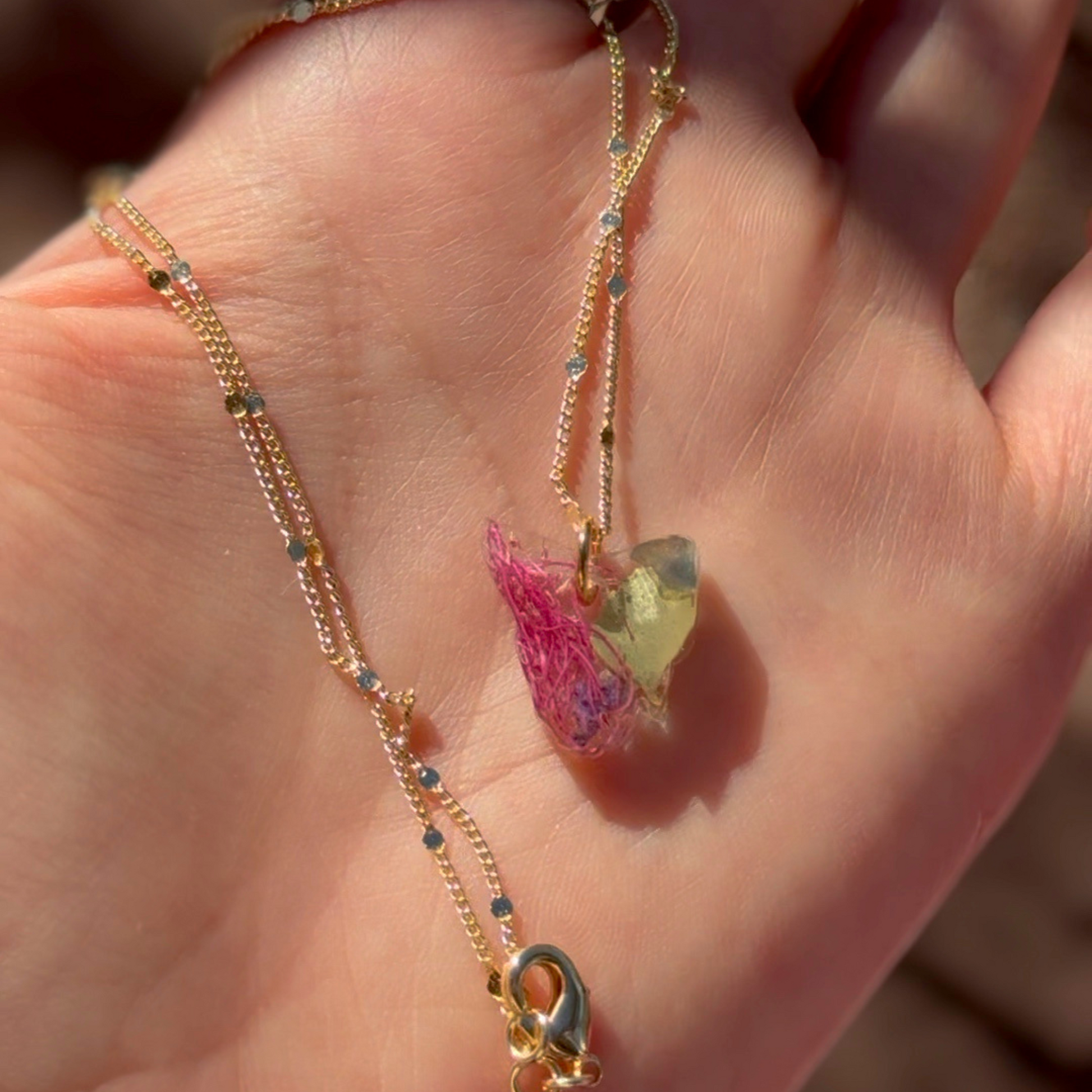 Tasmania Pendant Necklace in 14k Waterproof Gold, Resin Flower Necklace, Native Flower Jewellery, Close up shot